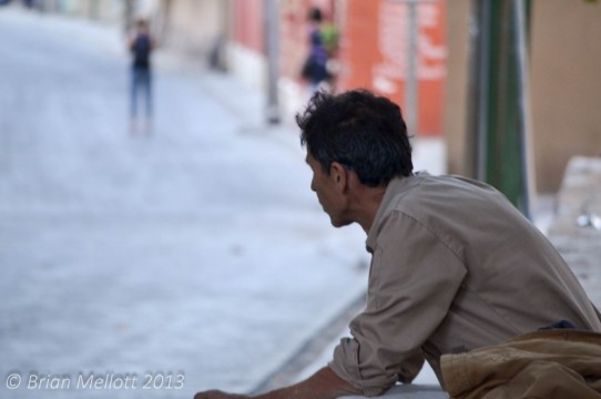 Man Waits for Bus